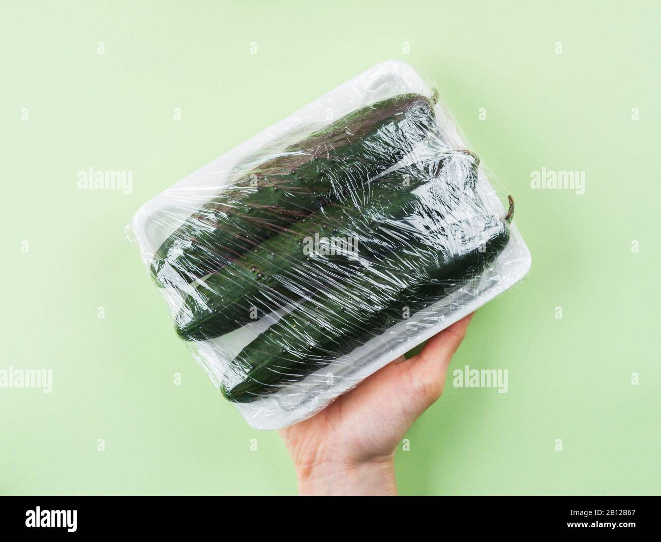 Fresh produce wrapped in plastic film Stock Photo Alamy