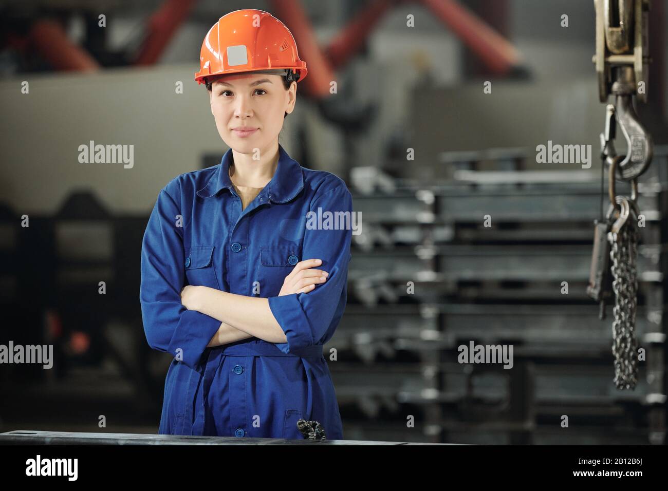 Woman in blue uniform working hi-res stock photography and images - Alamy