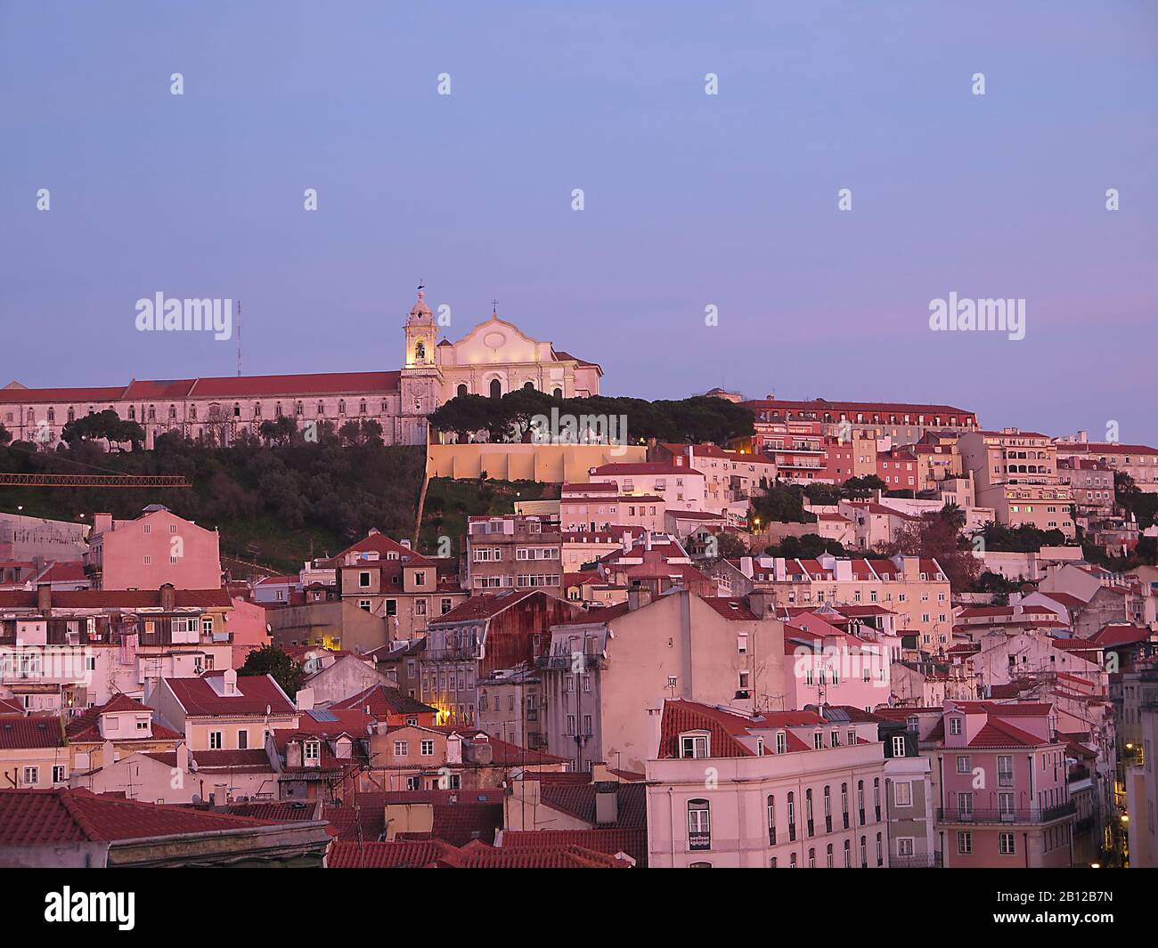 View from Miradouro da Senhora do Monte in Graca to the Convento de Nossa Sehora Church, Alfama and Tejo river Stock Photo