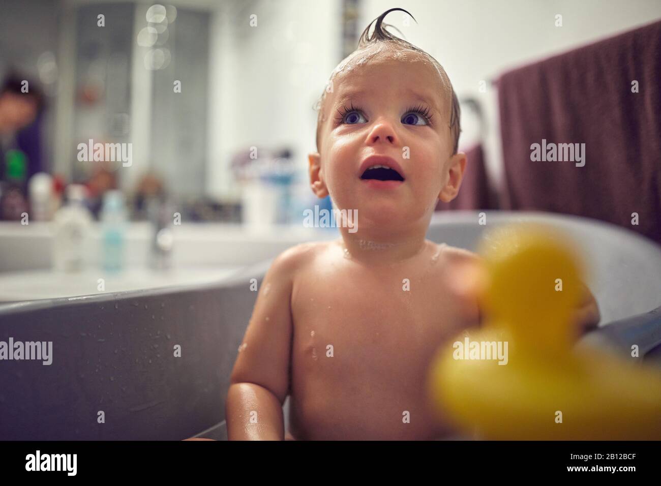 Happy cute boy washing and bathing.Young children take a bath. Children