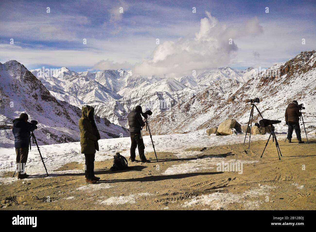 Tourist expedition searching snow leopard in Ulley valley. Ladakh. Himalayas. India Stock Photo