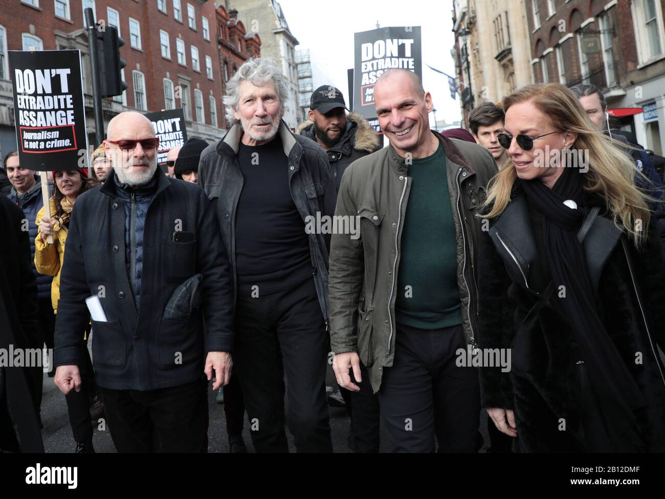 London, UK. 22nd Feb, 2020. L-R Musician Brian Eno, Roger Waters and politician Yanis Varoufakis walk in protest with hundreds of activists fighting to stop the extradition of Julian Assange to the United States for committing espionage charges against the American government on Saturday, February 22, 2020 in London. The trial to extradite Julian Assange begins on Monday in London on February 24 2020. Photo by Hugo Philpott/UPI Credit: UPI/Alamy Live News Stock Photo