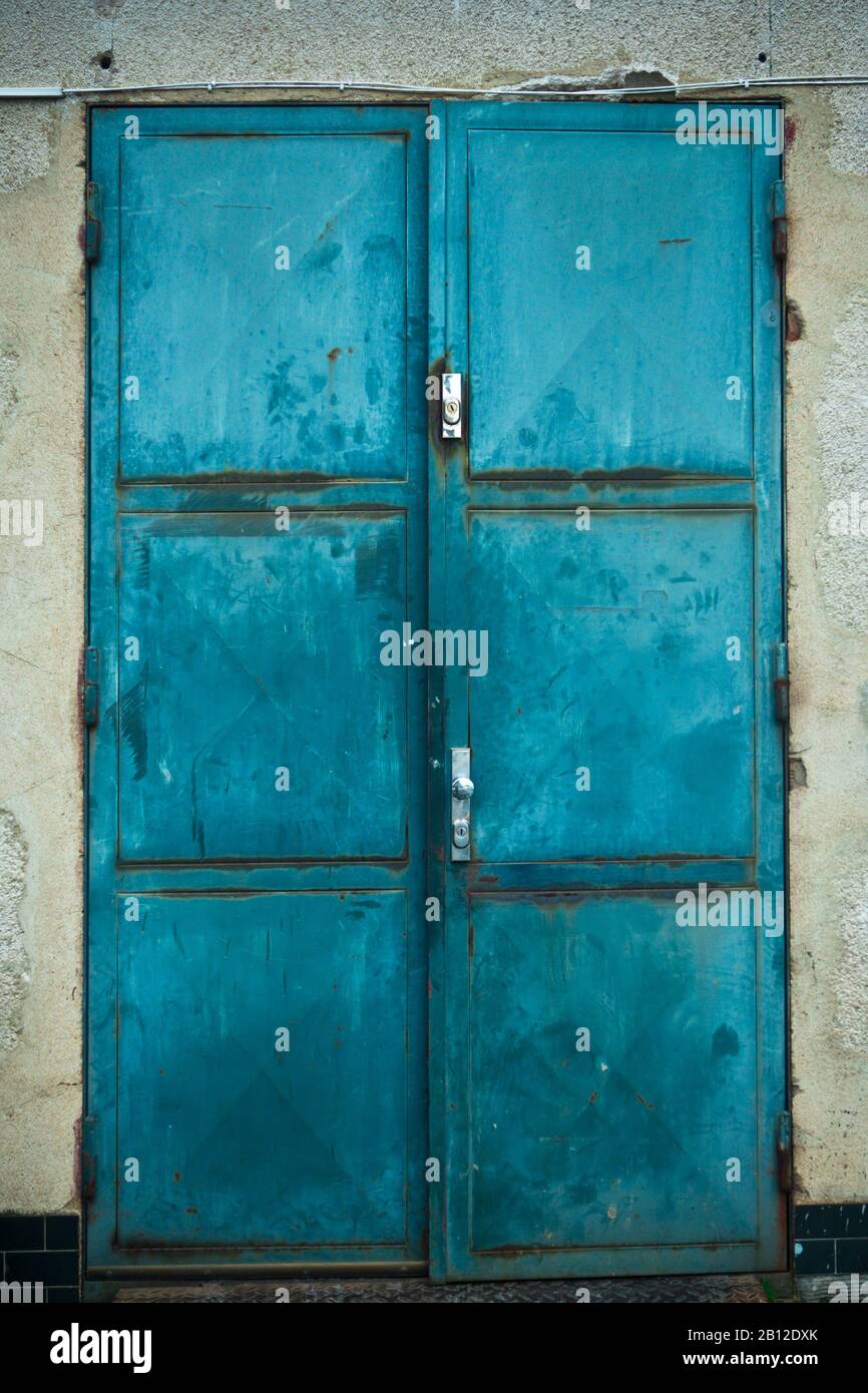 metal green double door closed Stock Photo