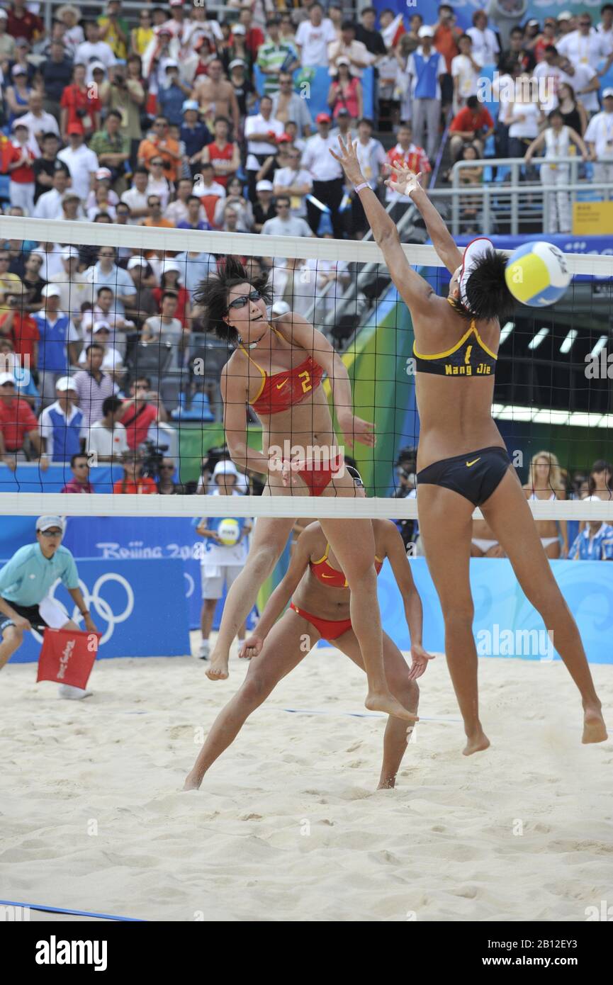 Beijing, CHINA.   Beach Volleyball - Beijing Olympic Basketball Venue,  Black Kit - China 1 Player No. 1 Jie WANG and No. 2 Jia TAIN, and CHN 4 Player No. 1 Chen XUE and No.2 Xi ZHANG.  Tuesday - 19/08/2008  [Mandatory Credit: Peter SPURRIER, Intersport Images Stock Photo