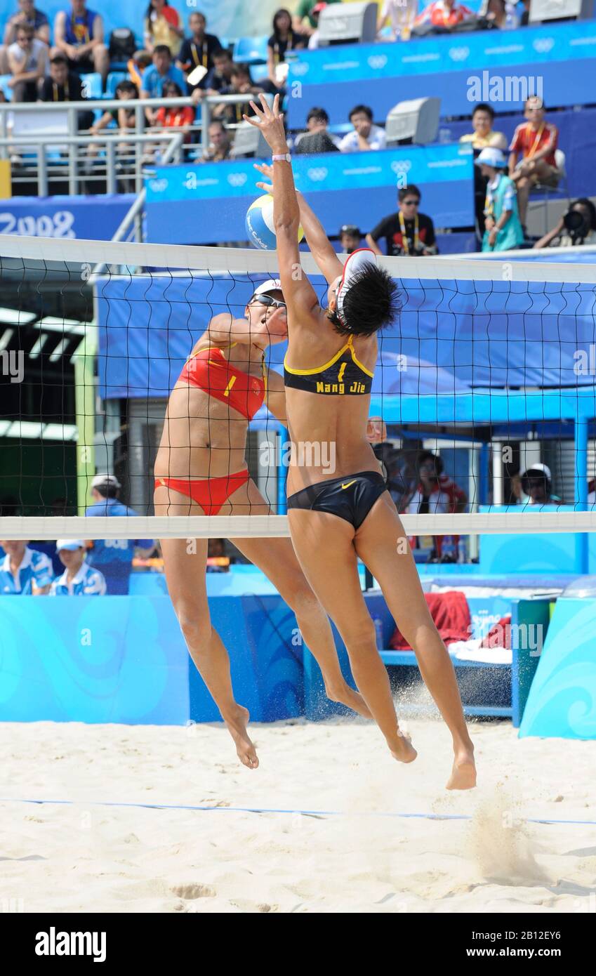 Beijing, CHINA.   Beach Volleyball - Beijing Olympic Basketball Venue,  Black Kit - China 1 Player No. 1 Jie WANG and No. 2 Jia TAIN, and CHN 4 Player No. 1 Chen XUE and No.2 Xi ZHANG.  Tuesday - 19/08/2008  [Mandatory Credit: Peter SPURRIER, Intersport Images Stock Photo