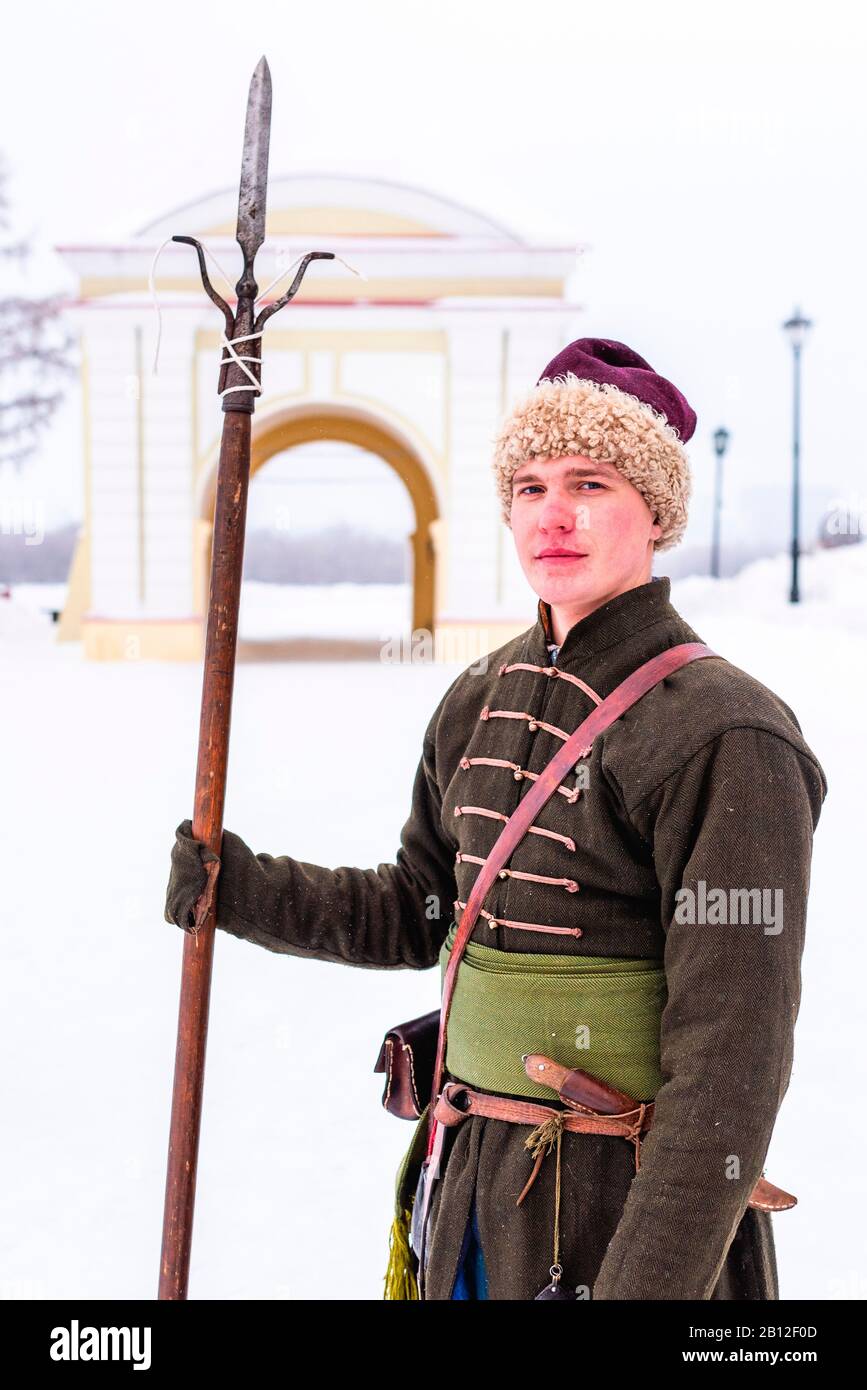 Man with spear in traditional clothes, Omsk, Siberia, Russia Stock Photo