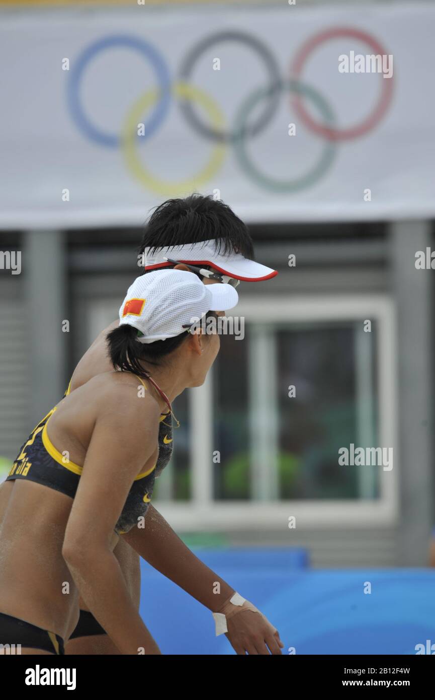 Beijing, CHINA.   Beach Volleyball - Beijing Olympic Basketball Venue,  Black Kit - China 1 Player No. 1 Jie WANG and No. 2 Jia TAIN, and CHN 4 Player No. 1 Chen XUE and No.2 Xi ZHANG.  Tuesday - 19/08/2008  [Mandatory Credit: Peter SPURRIER, Intersport Images Stock Photo