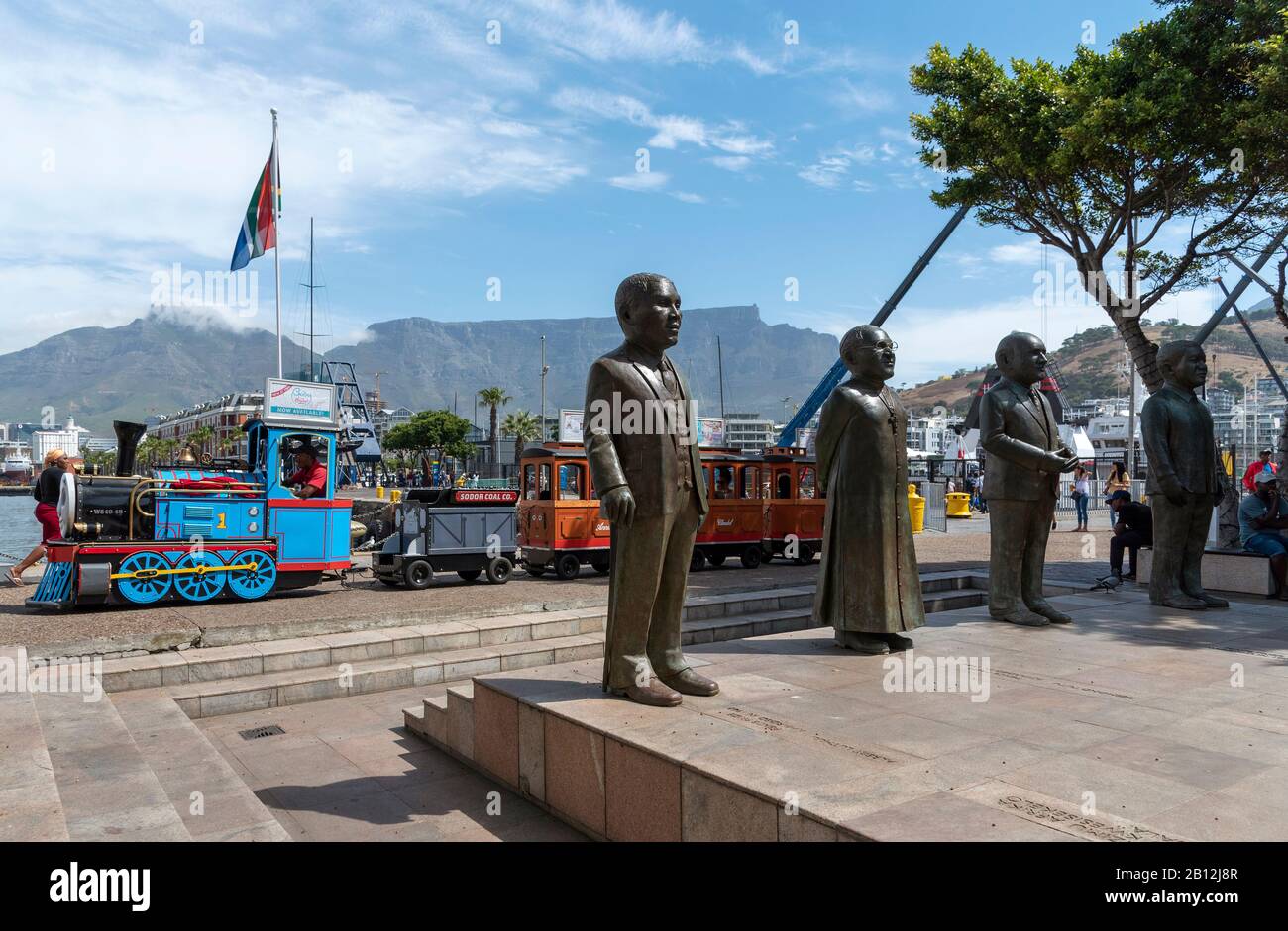 Cape Town, South Africa. Dec 2019. Children's train ride passing Nobel Square and its famous statesmen on the V&A waterfront, Cape Town Stock Photo