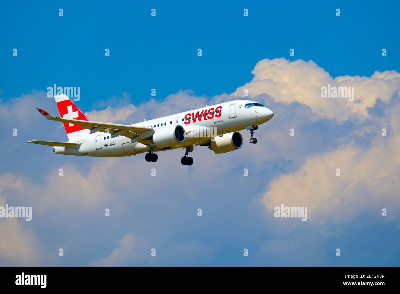 Swiss airlines airplane preparing for landing at day time in ...