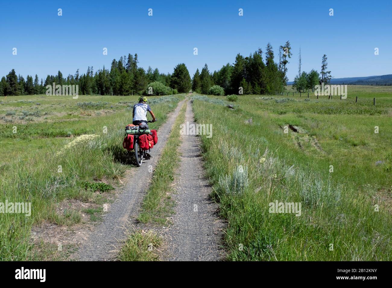 ID00785-00...IDAHO - Vicky Spring cycling the Yellowstone Branch Line Trail in Fremont County along the Great Divide Mountain Bike Trail. Stock Photo