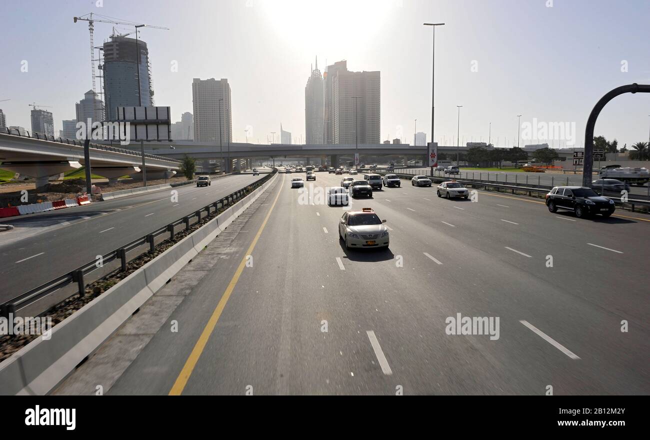 Traffic,Modern architecture,High-rise buildings,Sheikh Zayed Road,Dubai Downtown,Dubai,United Arab Emirates,Middle East Stock Photo