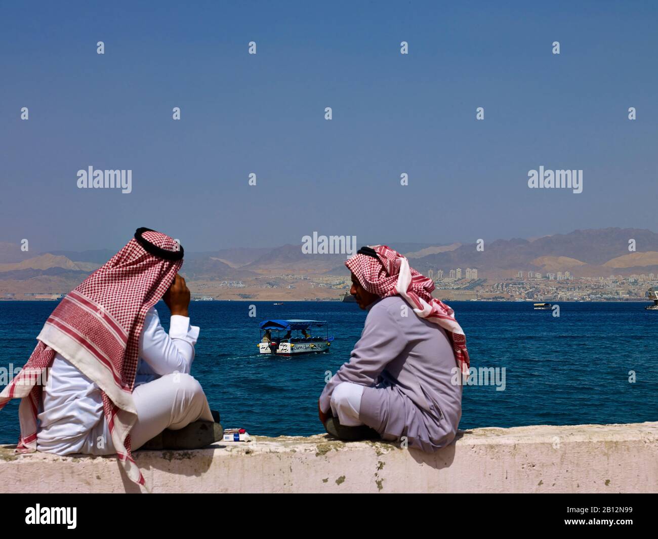 Two Bedouins in the Gulf of Aqaba,Jordan,Middle East Stock Photo