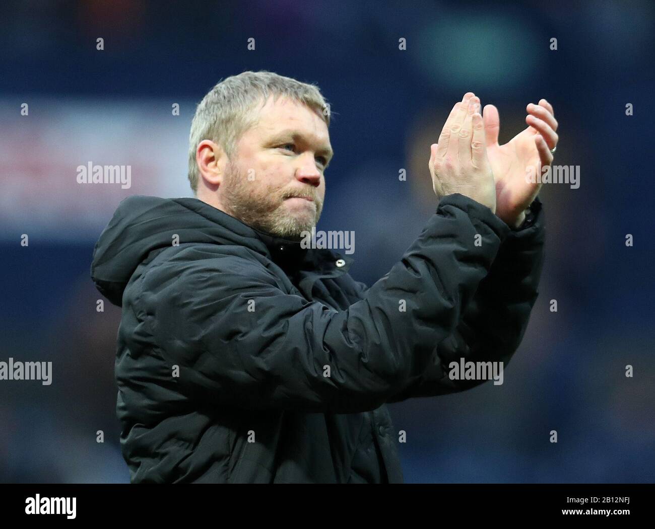 Deepdale Stadium, Preston, Lancashire, UK. 22nd Feb, 2020. English Championship Football, Preston North End versus Hull City; Hull City manager Grant McCann applauds the visiting supporters after the final whistle Credit: Action Plus Sports/Alamy Live News Stock Photo