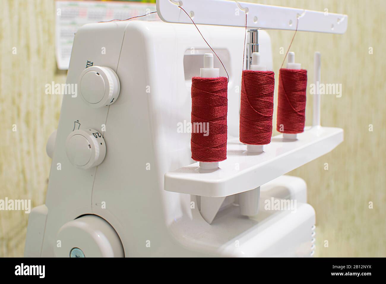 sewing machine for wrapping sections of textile materials Stock Photo Alamy