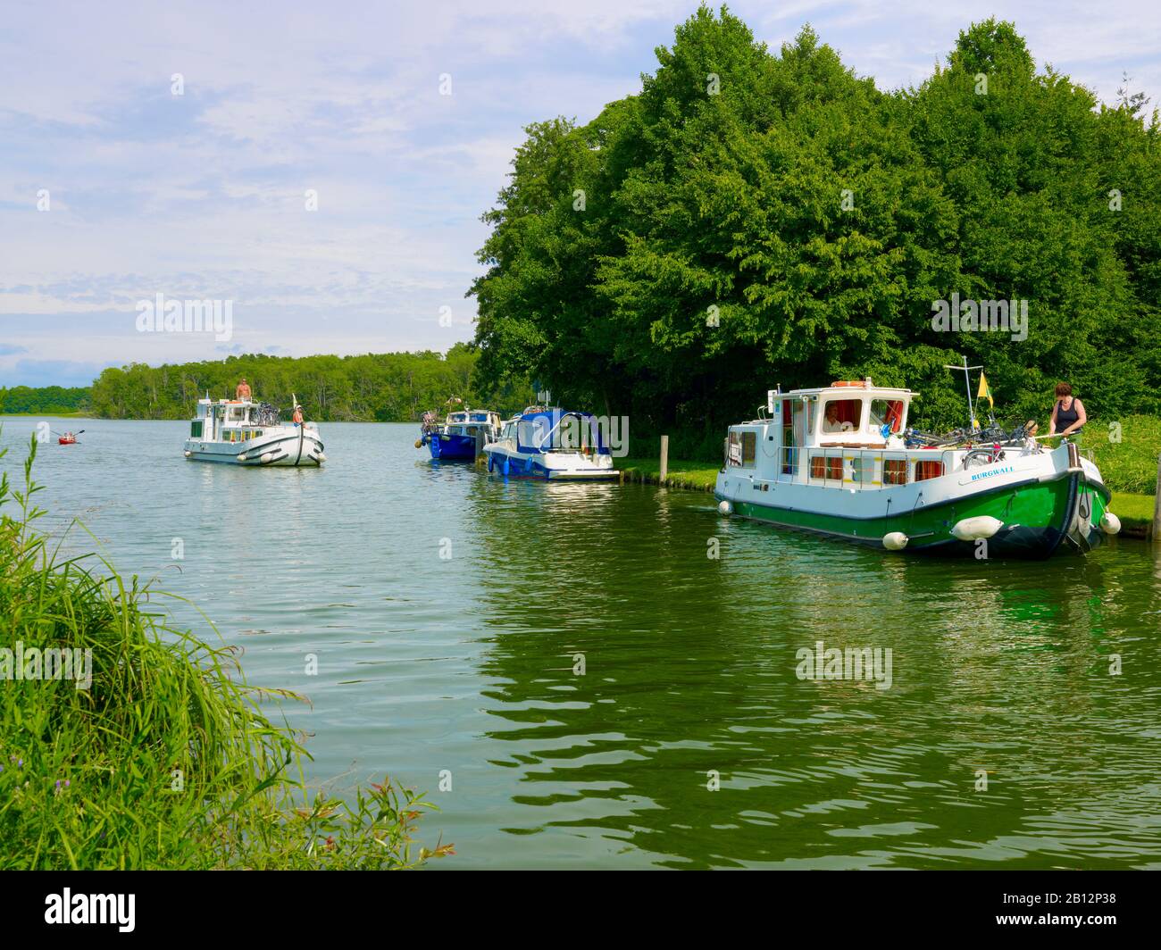 Ship traffic at the lock from Lake Haussee to Lake Stolpsee,Himmelpfort near Fuerstenberg,Brandenburg,Germany Stock Photo