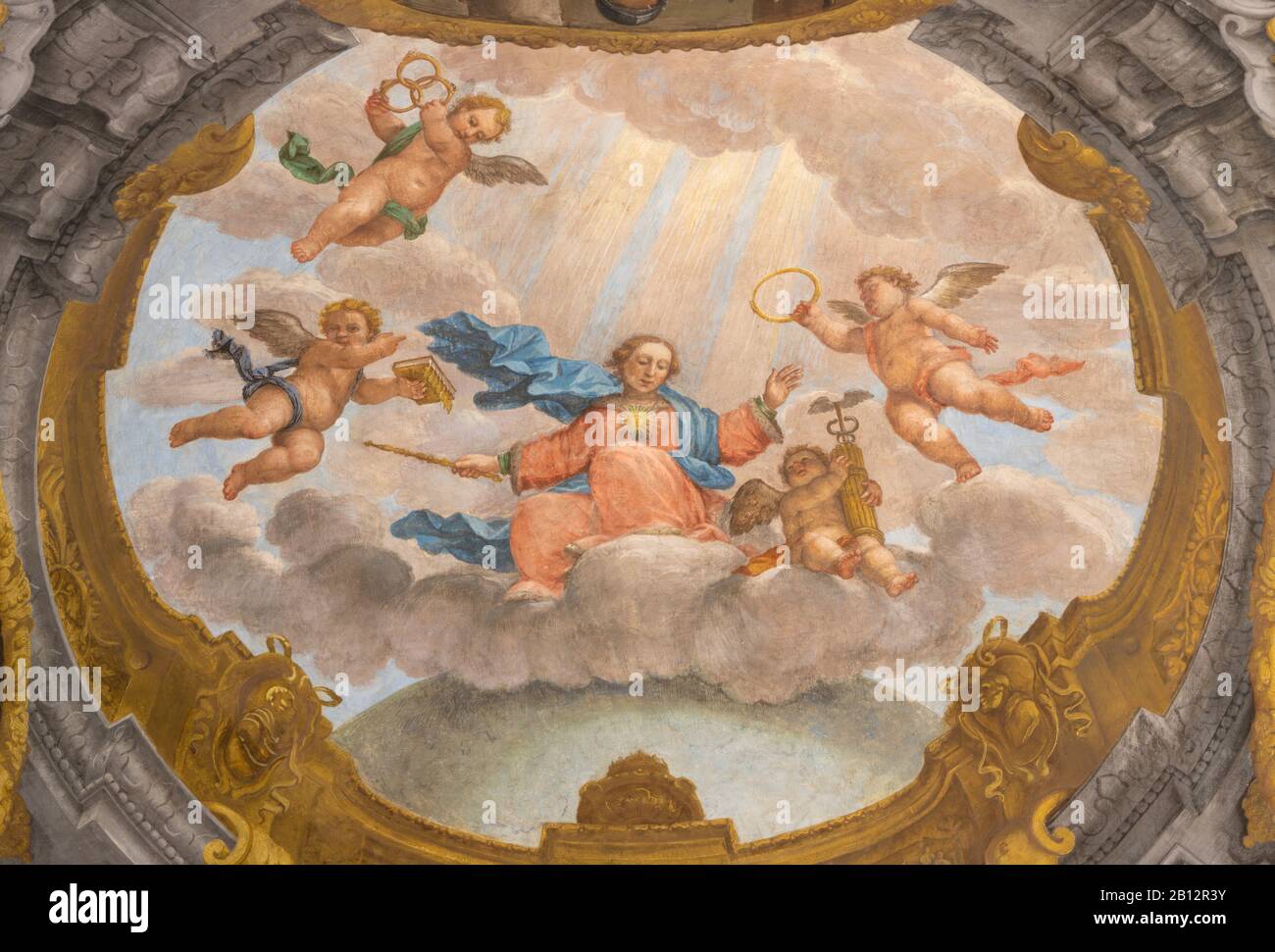 FERRARA, ITALY - JANUARY 30, 2020: The fresco of Madonna among the angels from ceiling of church Basilica di San Giorgio fuori le mura. Stock Photo