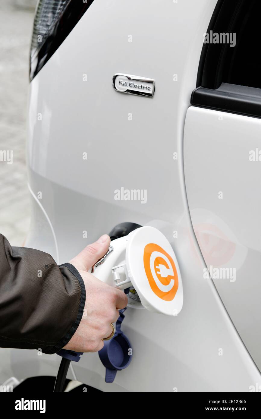 First series-produced,pure electric car in Germany,Citroen C-ZERO AIRDREAM at a charging station,charging,electromobility,electric car,Hamburg,Germany,Europe Stock Photo