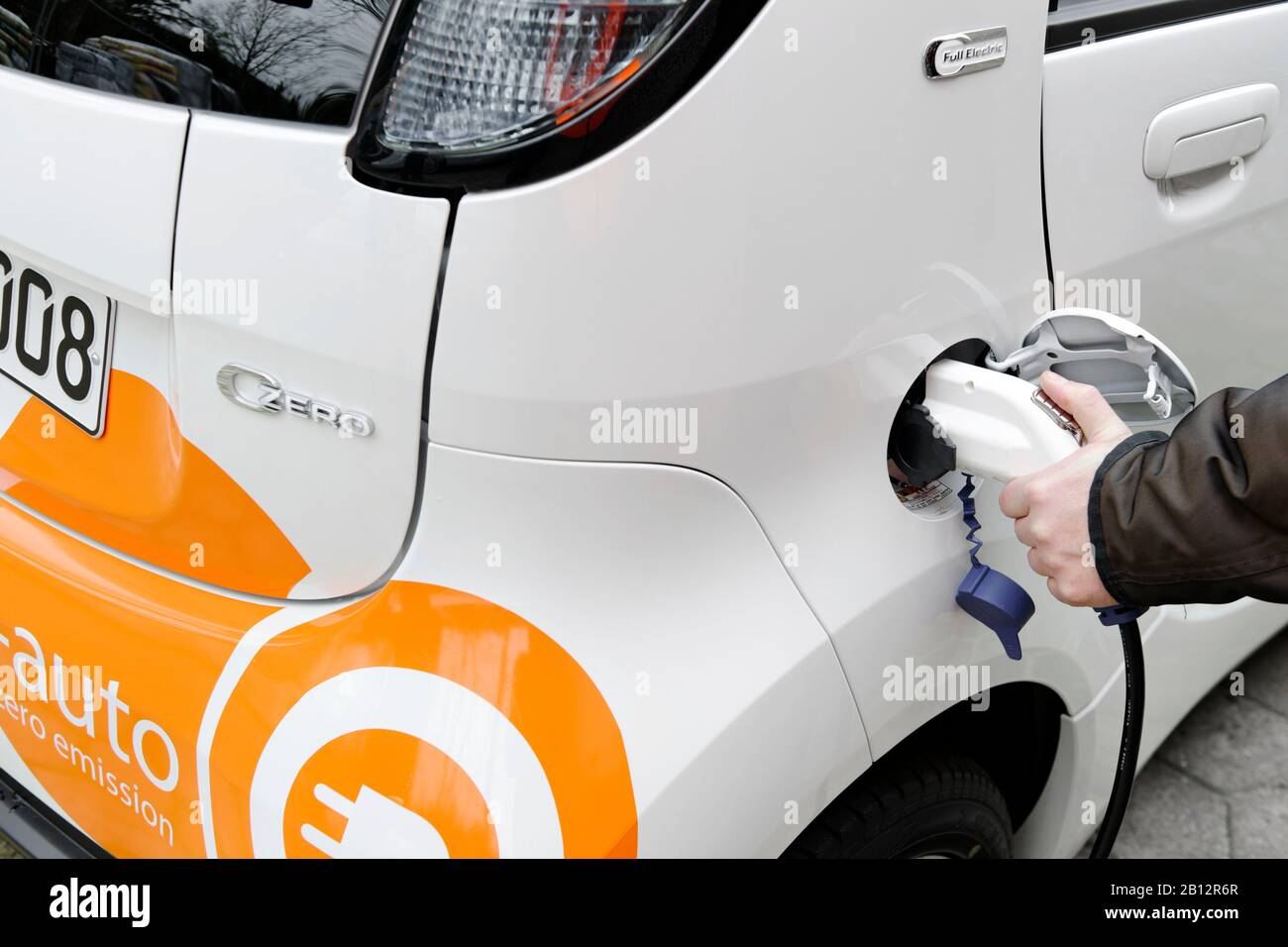 First series-produced,pure electric car in Germany,Citroen C-ZERO AIRDREAM at a charging station,charging,electromobility,electric car,Hamburg,Germany,Europe Stock Photo