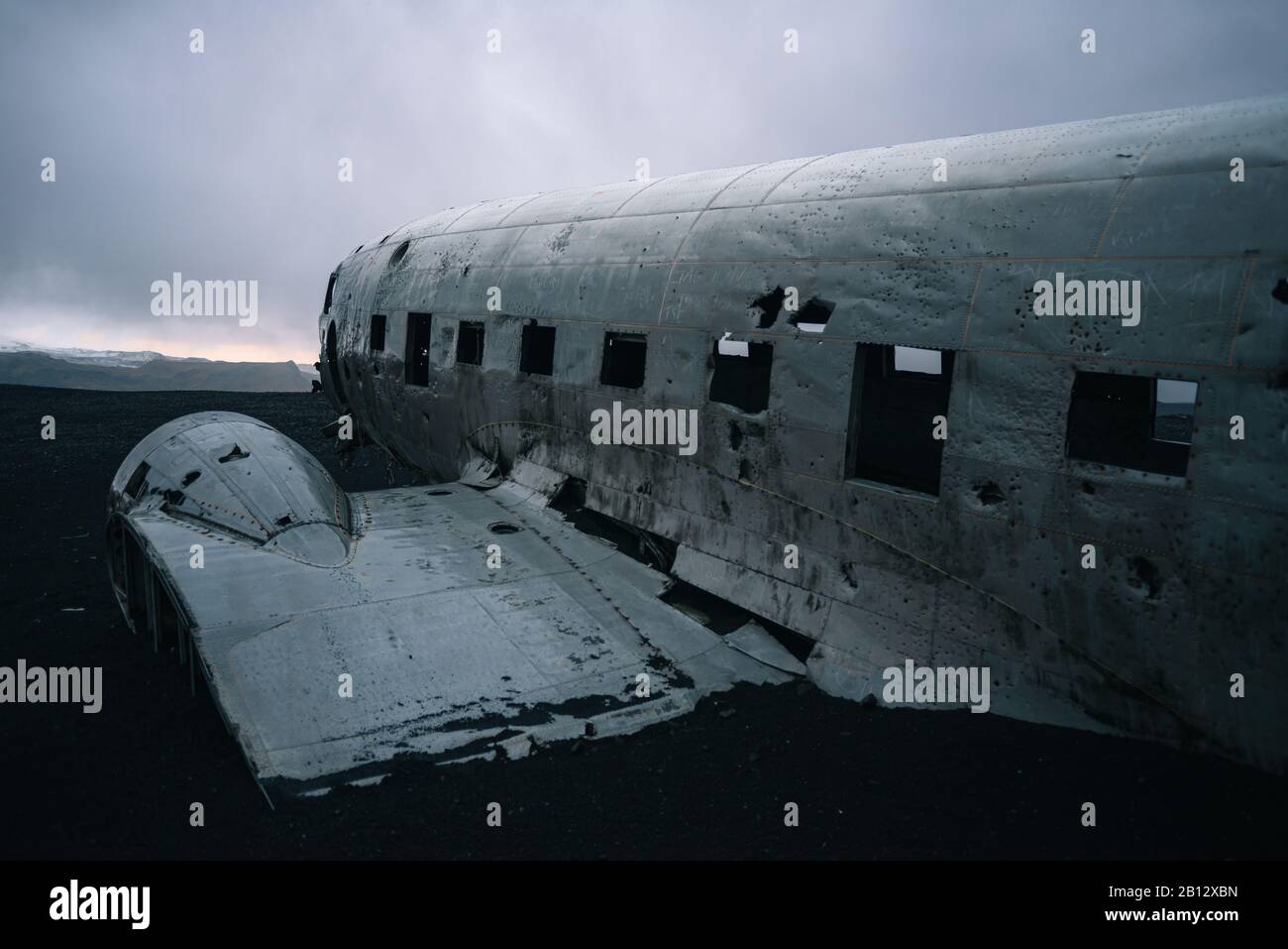The crashed U.S. Navy Dakota (C-117) plane wreckage at Solheimsandur, Iceland on the black sands beach. Stock Photo