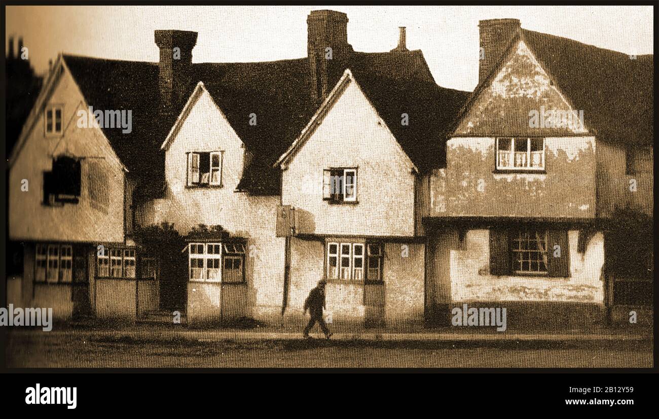 c 1940's -  An old photograph of the George  and Dragon Inn at Codicote (UK) . The  original Elizabethan building   is shown before the plaster rendering was removed from the woodwork. When it closed the half timbered building  it became a Chinese restaurant.  In 1279,  Laurence the Taverner was its landlord and in the 1400's had the name  'The Greyhound'.  Hertfordshire recruits were enrolled here to defend Hertfordshire from the Young Pretender in 1745 and legend links it to a highwayman William Page, who was captured and executed at Hertford in 1758. Stock Photo