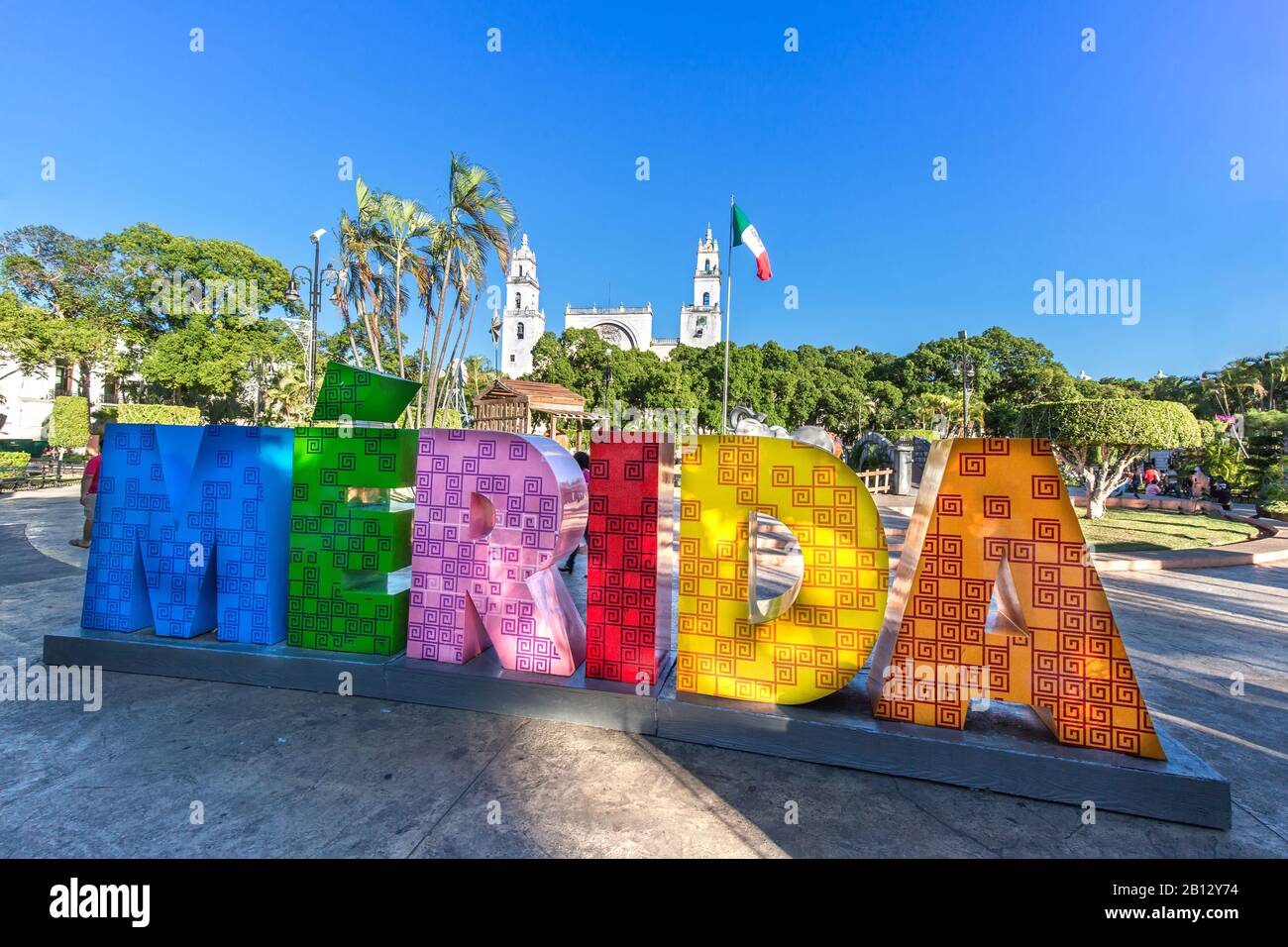 Big colorful letters representing Merida with an iconic Merida Cathedral at the background Stock Photo