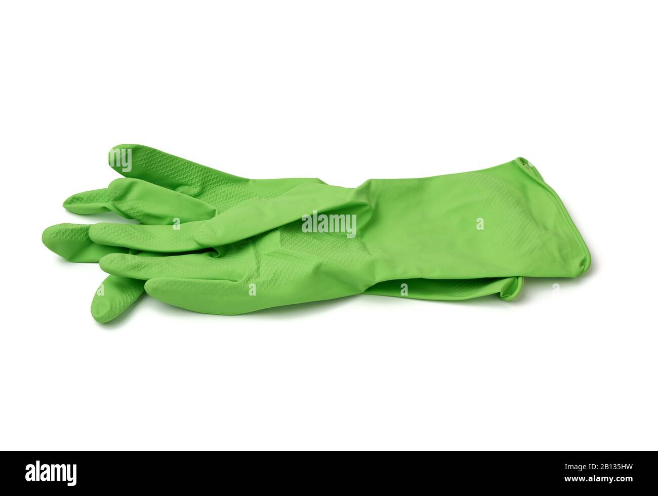 green rubber gloves for cleaning washing dishes isolated on white background, close up Stock