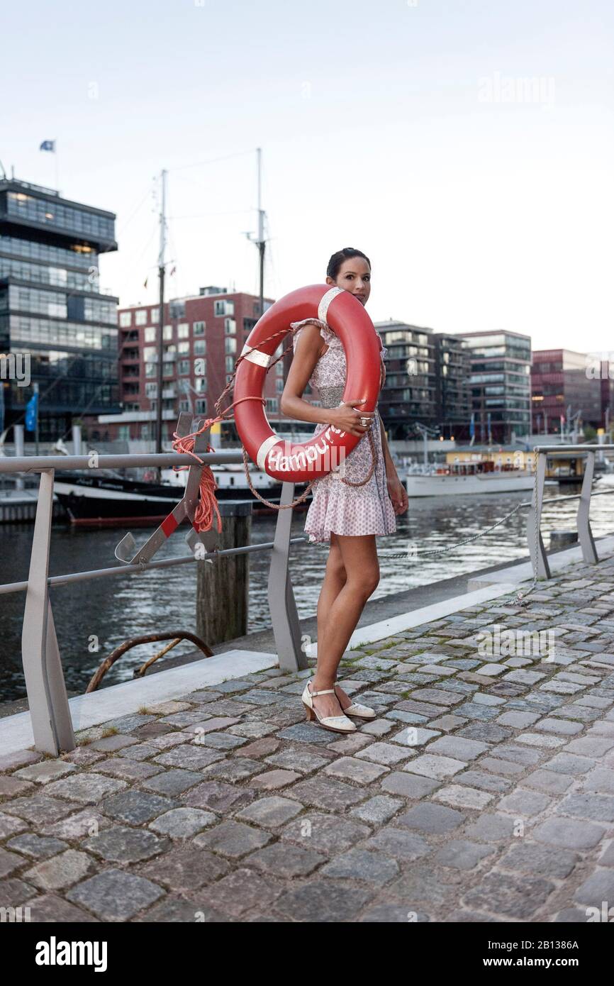 Hamburg, Germany, Woman outfit twenties with cigarette holder Stock Photo -  Alamy