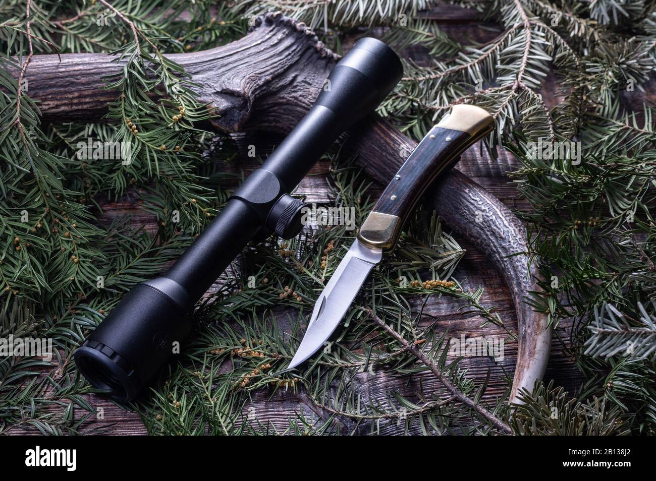 Hunting knife and scope. Hunting things. Hunting still life Stock Photo