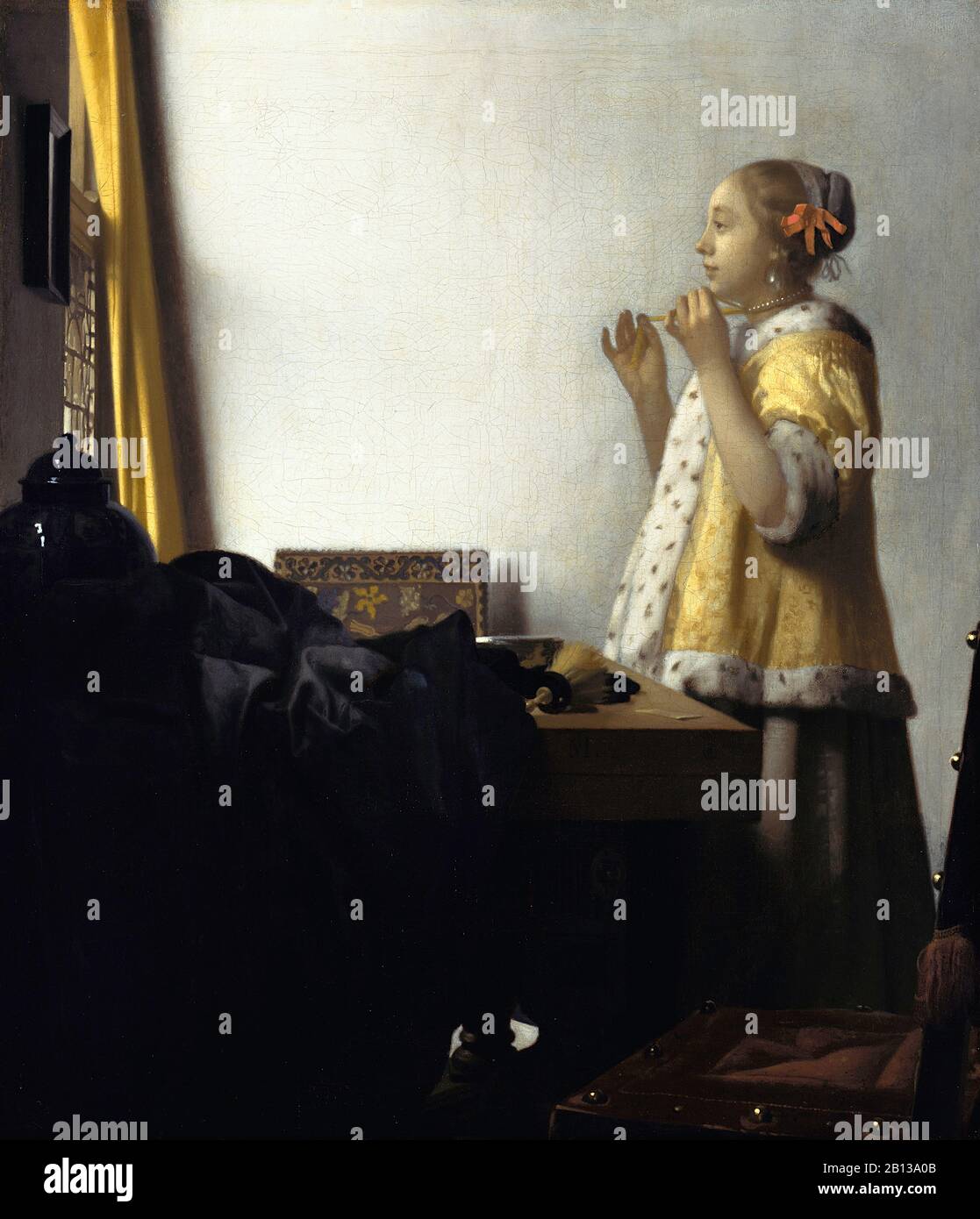 Woman with a Pearl Necklace (1664) by Johannes Vermeer - 17th Century Dutch Baroque Period Painting Stock Photo