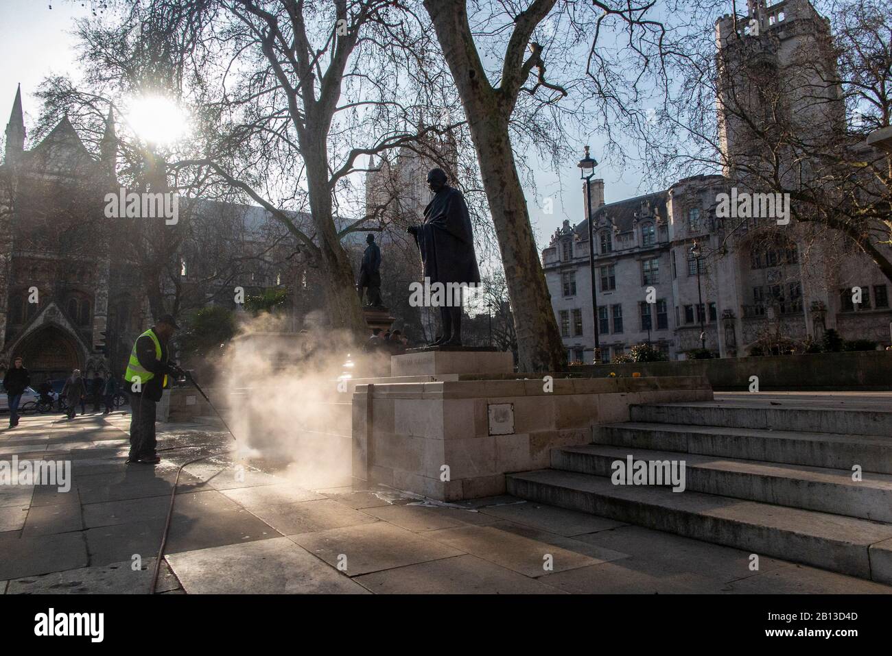 Pressure washing the statues outside the Houses of Parliament in