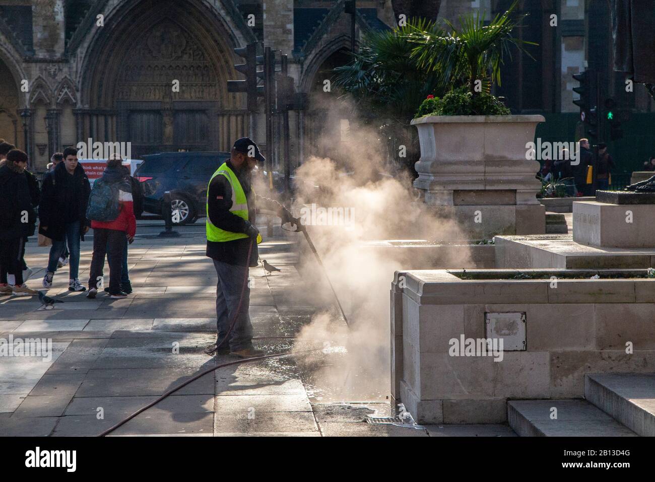 Pressure washing the statues outside the Houses of Parliament in
