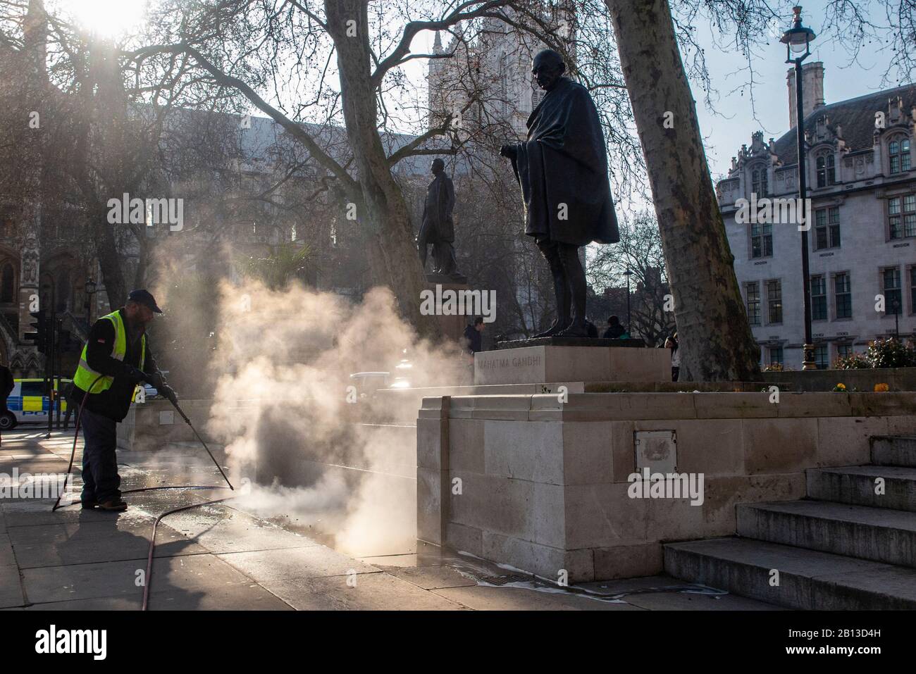 Pressure washing the statues outside the Houses of Parliament in