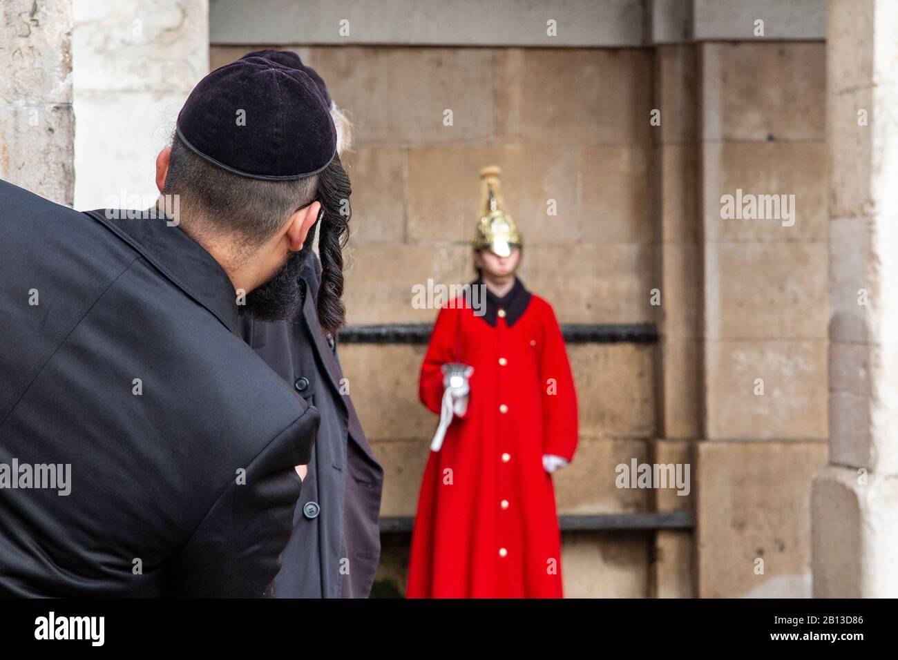 A hasidic jew admires a guard on parade in Horseguard's Parade Stock Photo