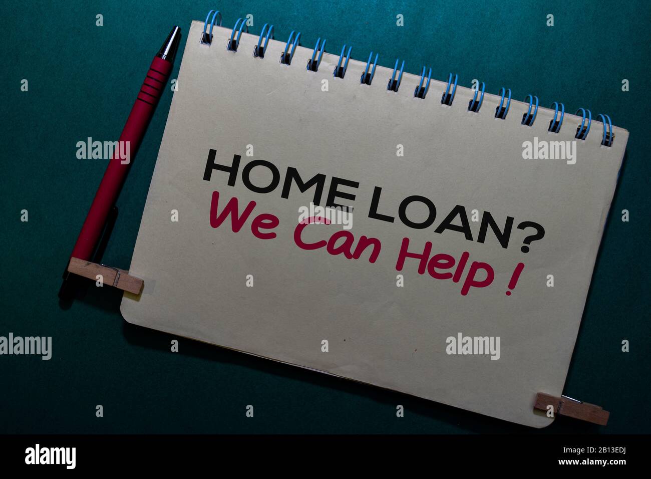 Lending Help Home Loan? We Can Help! write on a Book isolated on Office Desk Stock ...