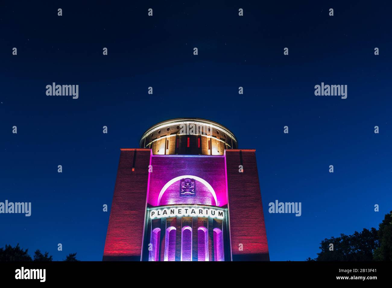 Colored illuminated planetarium at the city park,Barmbek,Hamburg,Germany Stock Photo