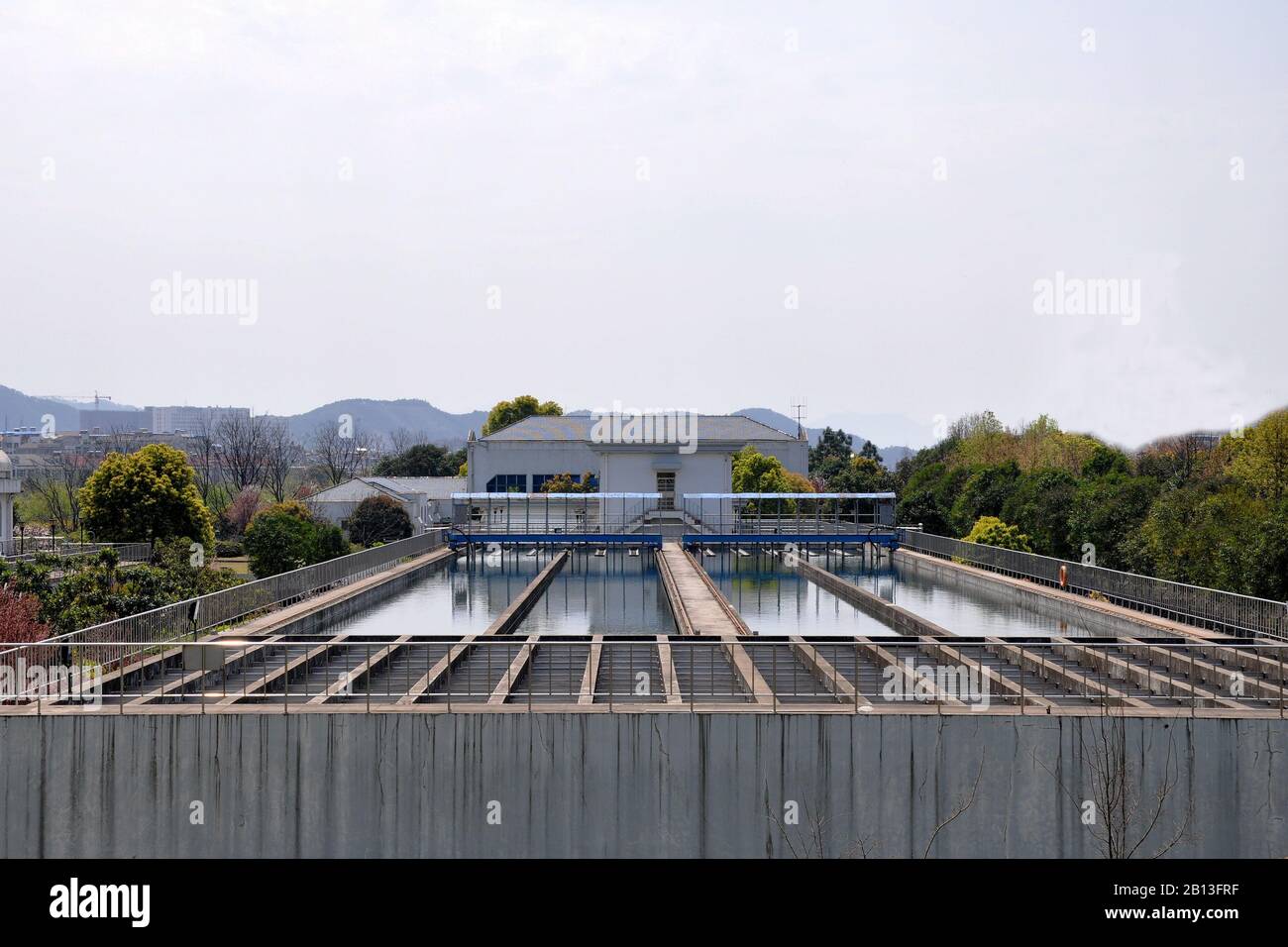 Modern wastewater treatment plant. Tanks for aeration and biological purification of sewage by using active sludge. Stock Photo