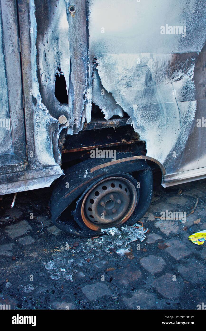 Burned european ambulance tire closeup arson in Schoneberg Berlin Stock Photo