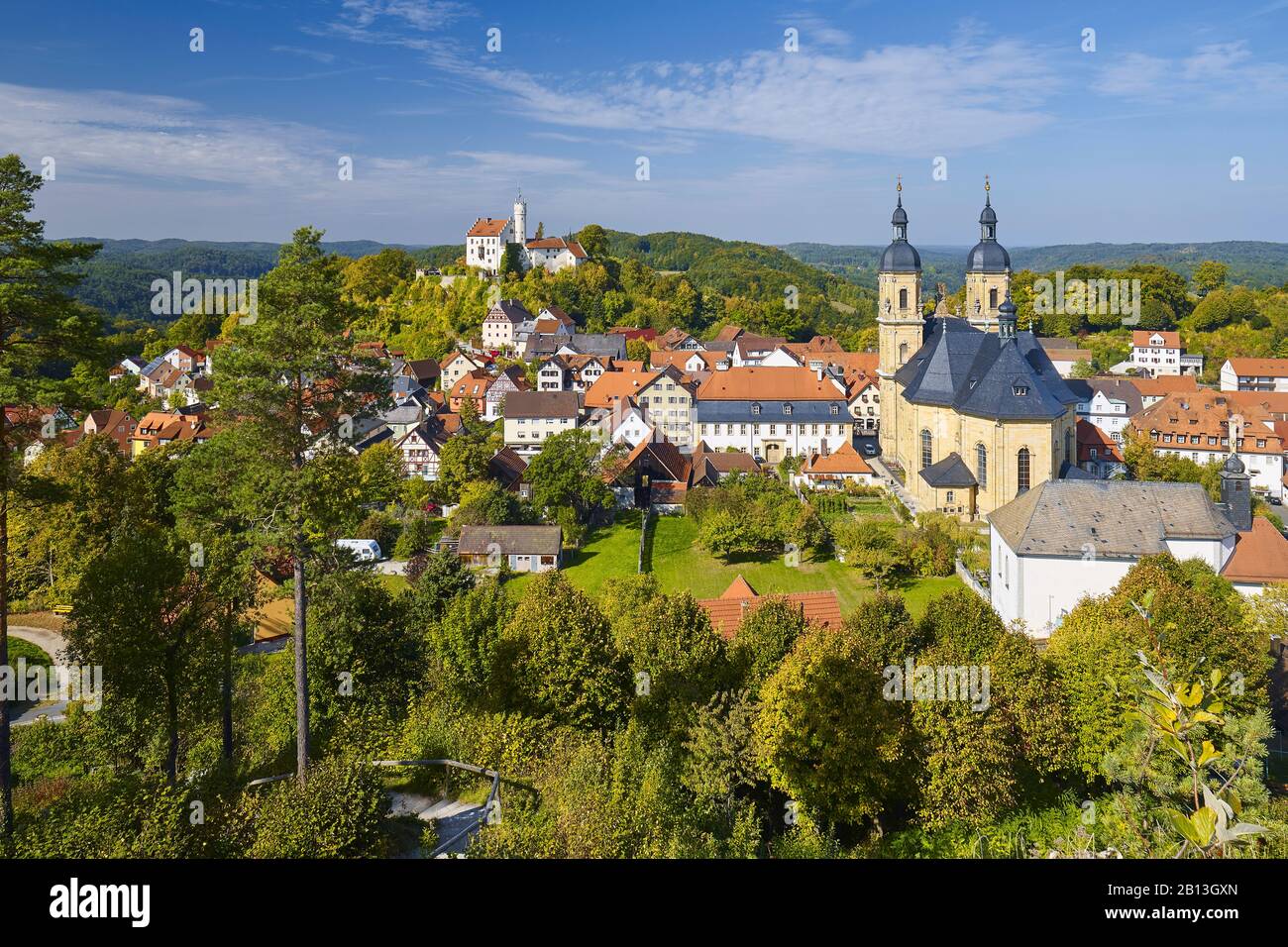 View from the Kreuzberg on Pilgrimage Church and castle,Goessweinstein,Upper Franconia,Bavaria,Germany Stock Photo