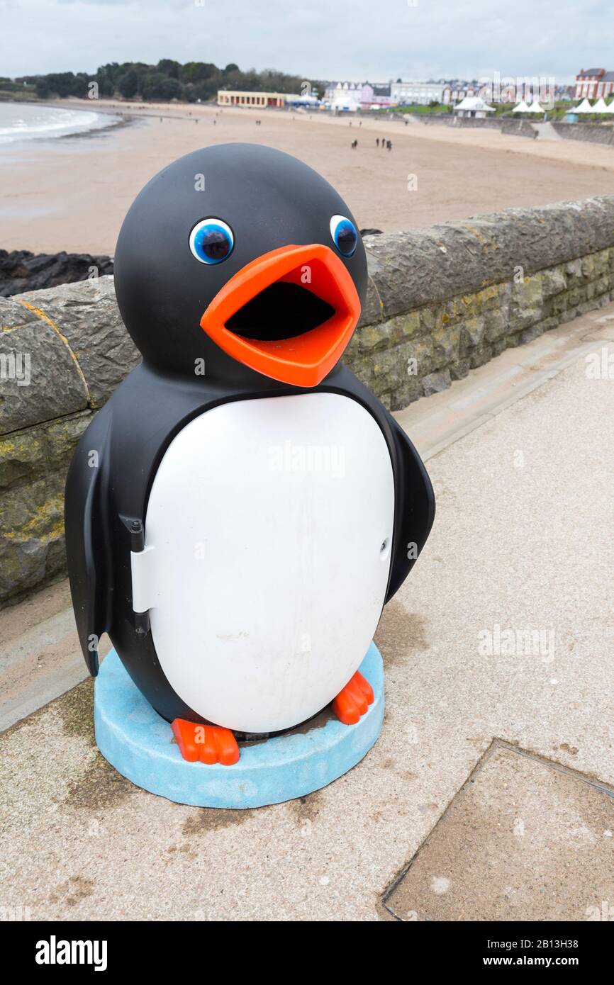 Litter bin shaped like a penguin, Barry Island, Wales, UK Stock Photo