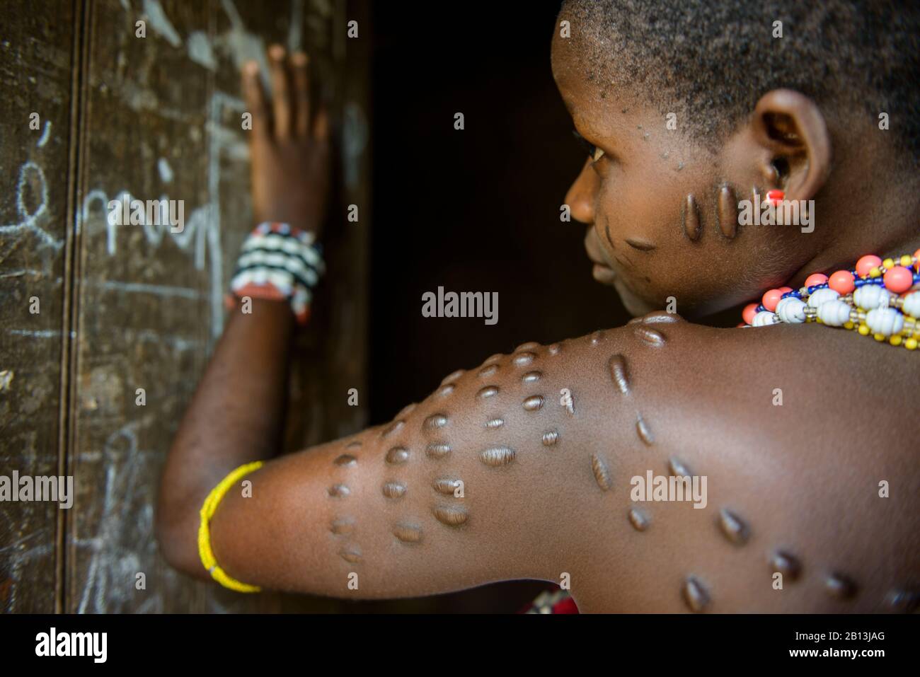 Girl with scarification of the tribes of northern Benin,Africa Stock Photo