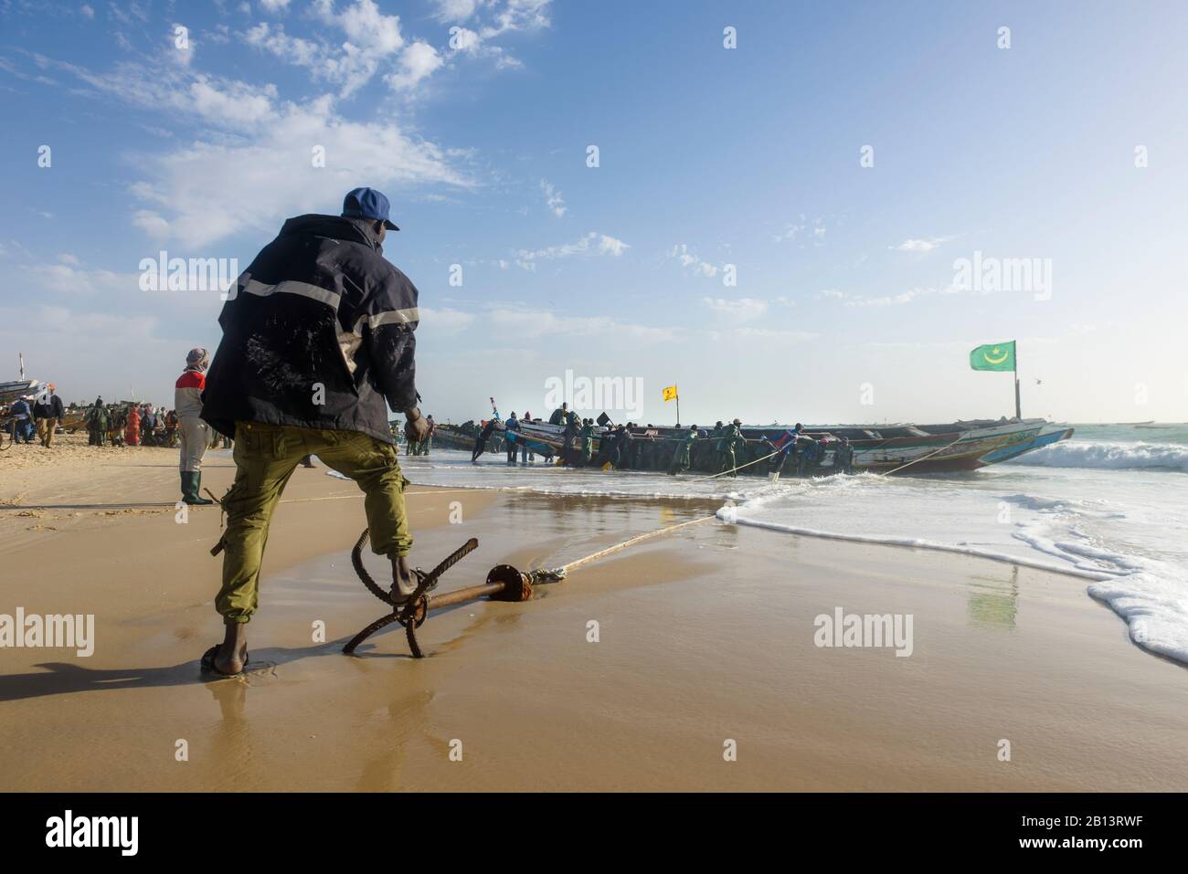 FIshermen,peddlers,boats at Nouakchott's famous fish market Stock Photo