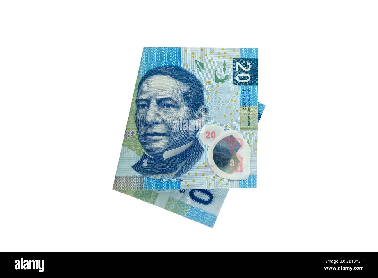 A single middle folded 20 mexican peso bill isolated and on white background Stock Photo