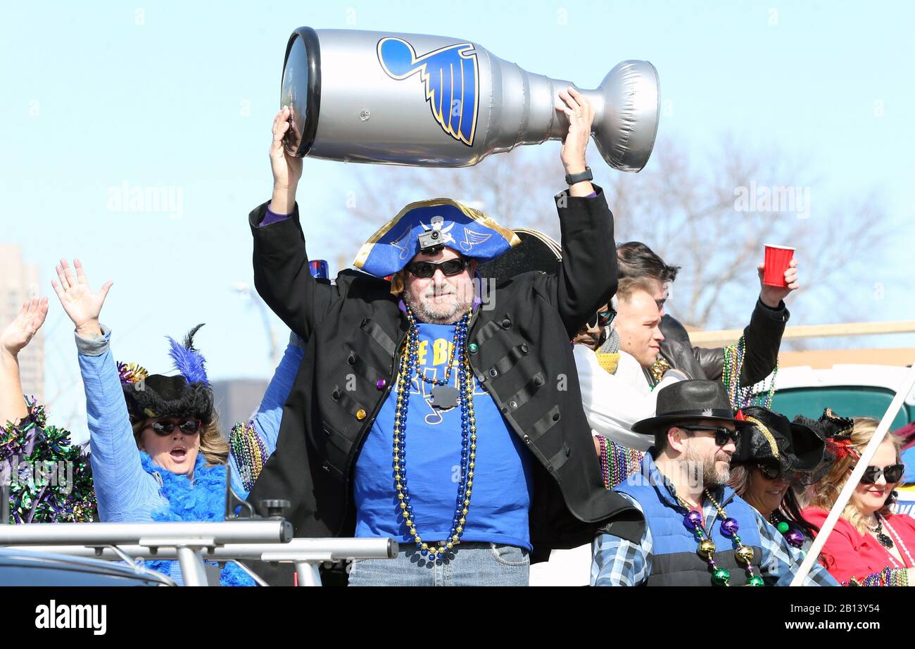St. Louis, United States. 22nd Feb, 2020. A fan aboard a float displays a plastic Stanley Cup during the St. Louis Mardi Gras Parade in St. Louis on Saturday, February 22, 2020. The St. Louis Blues, winner of the 2019 Stanley Cup, were the theme of the Mardi Gras Parade. Photo by Bill Greenblatt/UPI Credit: UPI/Alamy Live News Stock Photo