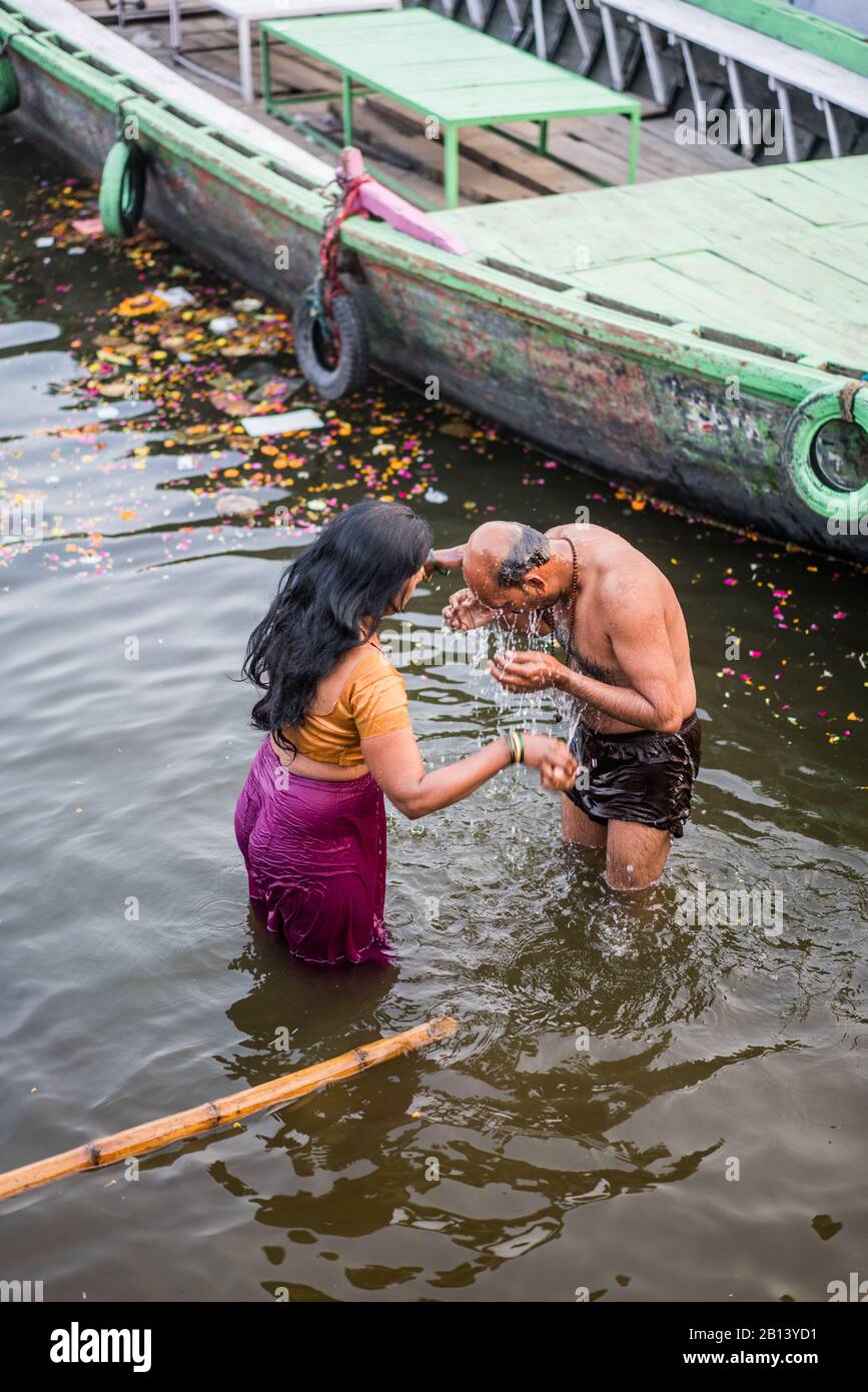Ceremony bathing in the Ganga river, Varanasi, India, Asia Stock Photo -  Alamy