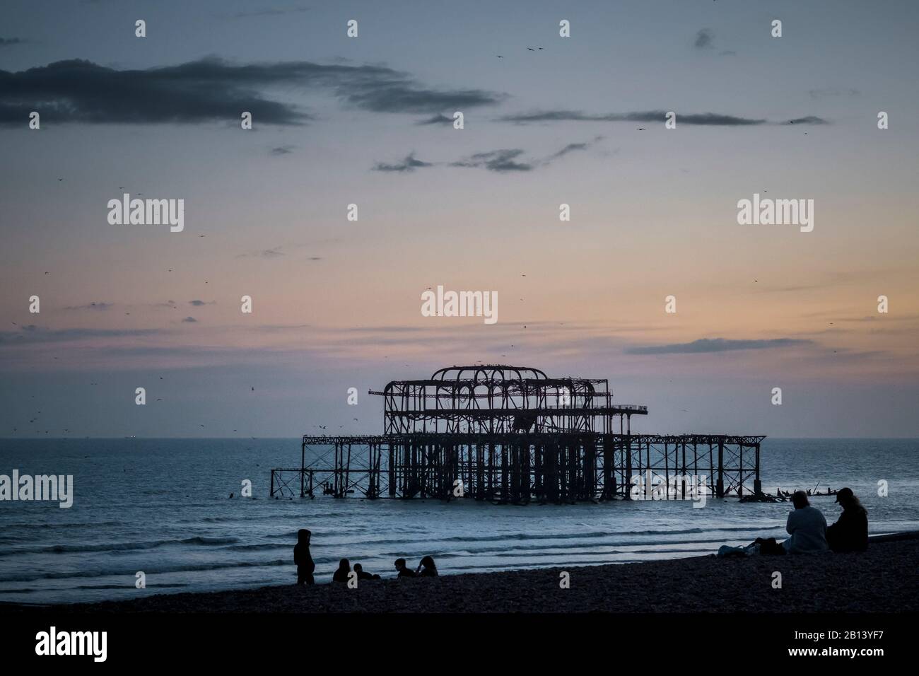 Burned West Pier by the sea,Brighton,England Stock Photo