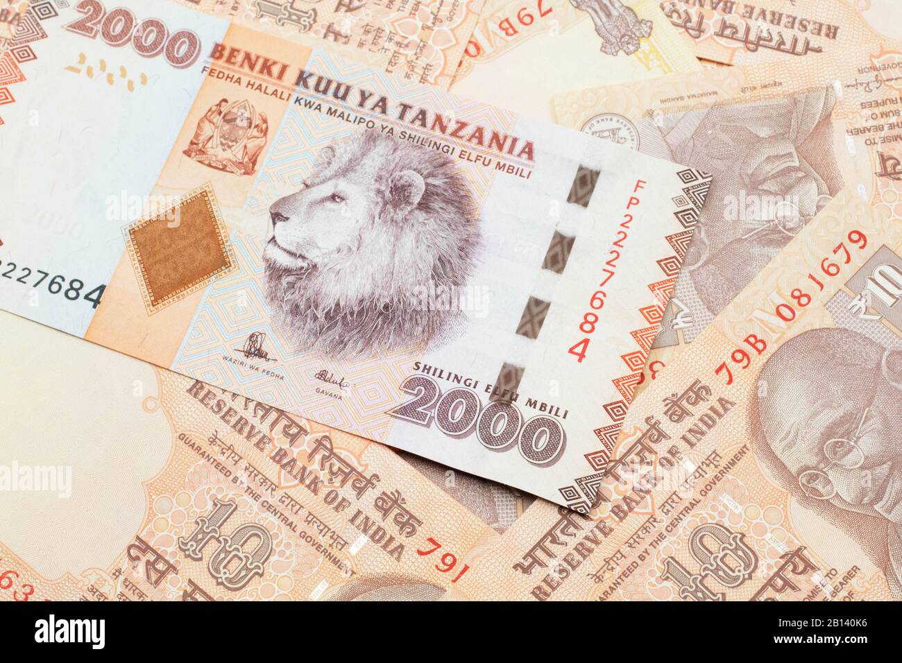 A Close Up Image Of A Two Thousand Tanzanian Shilling Bank Note On A Background Of Indian Ten Rupee Bank Notes Stock Photo Alamy