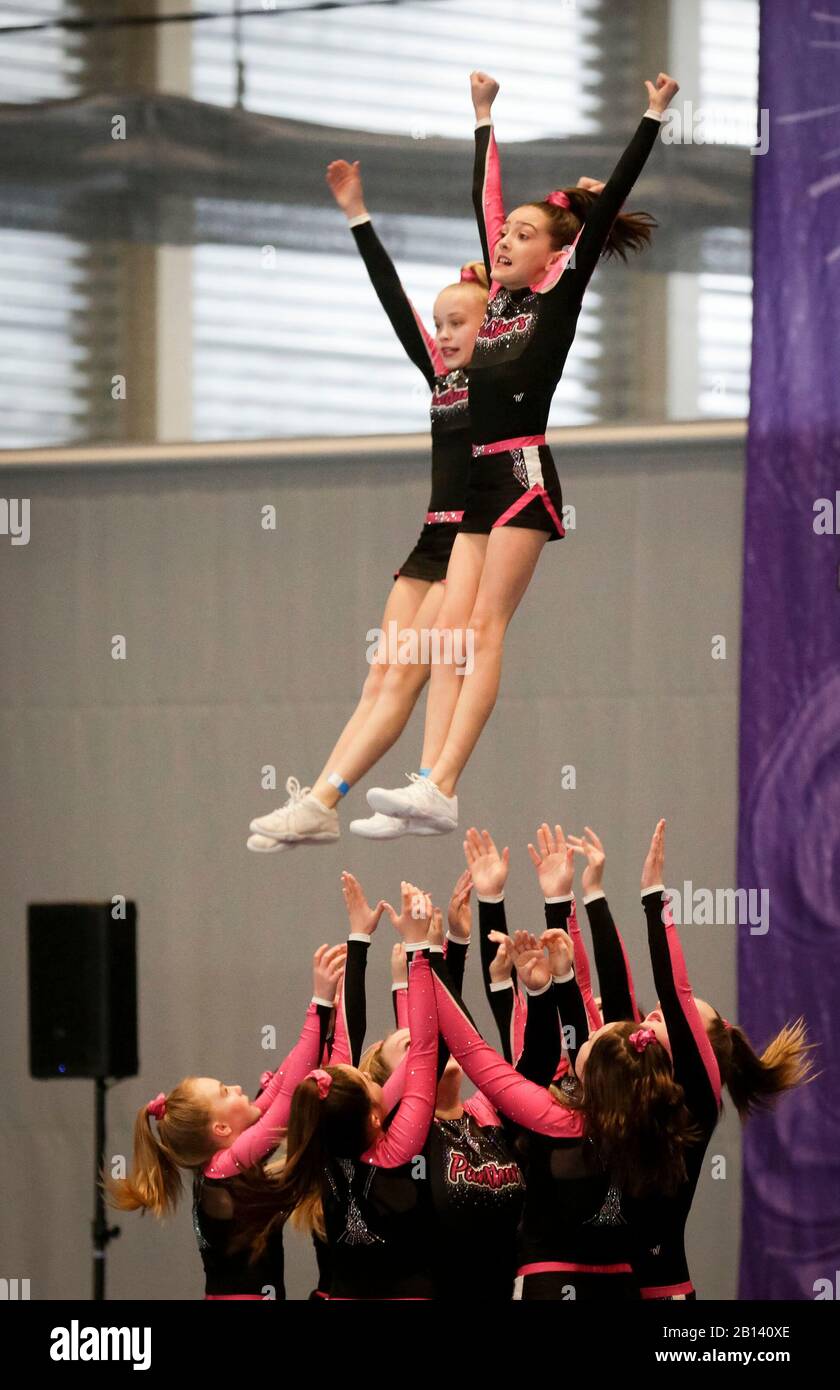 Richmond, Canada. 22nd Feb, 2020. Athletes perform during the 8th 'Mardi Parti' Cheer Extravaganza at Richmond Olympic Oval in Richmond, Canada, Feb. 22, 2020. Thousands of cheerleading athletes of different levels teamed up to participate in the annual event. Credit: Liang Sen/Xinhua/Alamy Live News Stock Photo