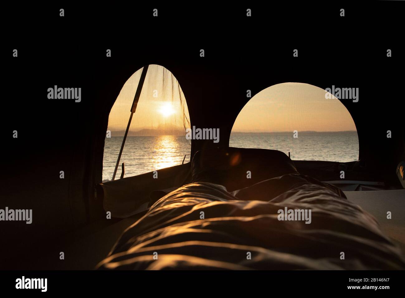 Camping Sunrise Roadtrip, Lake Garda, Italy Stock Photo