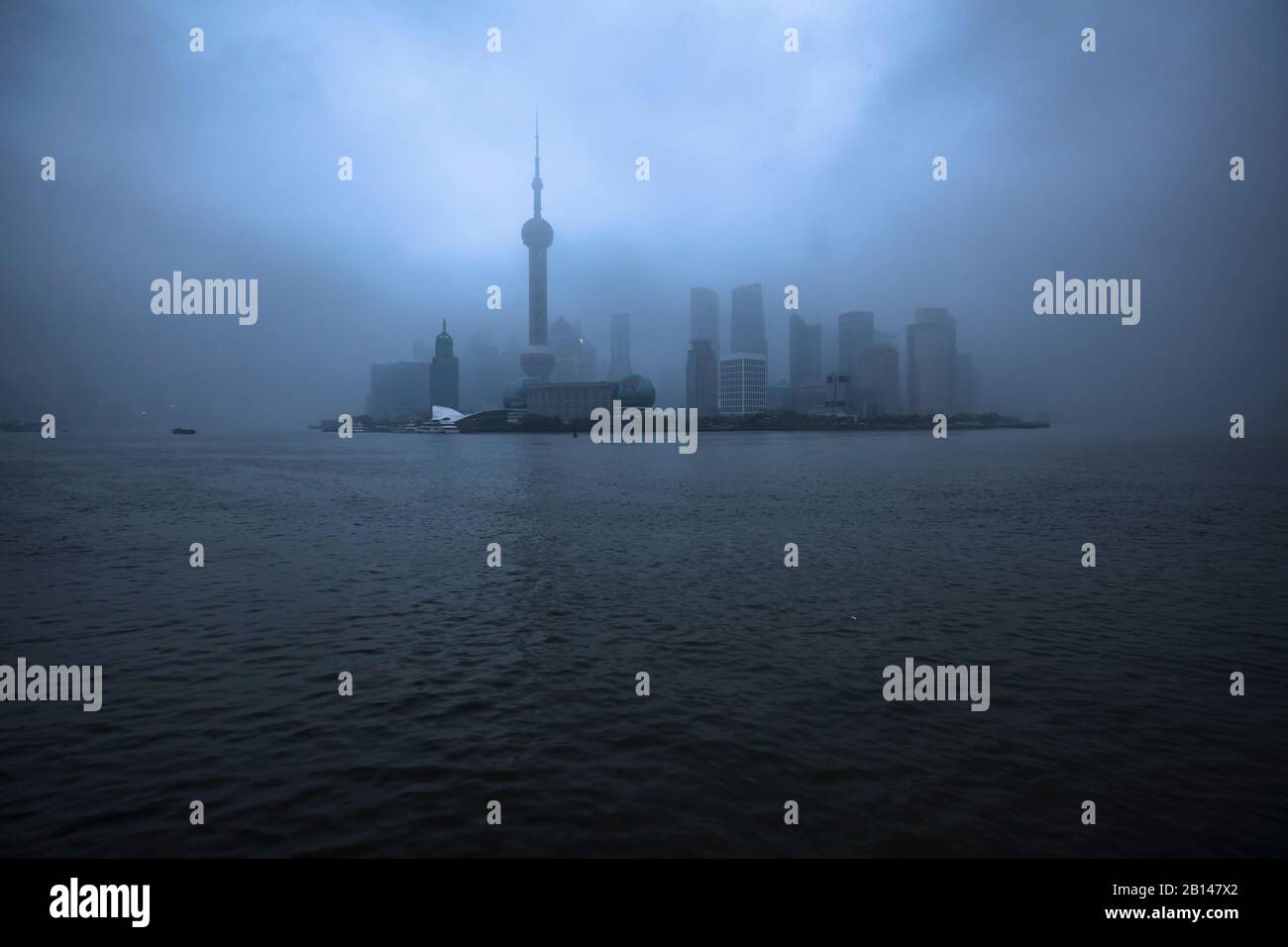 Shanghai skyline with Oriental Pearl Tower in morning fog, Lujiazui, Pudong, Shanghai, China, Asia. Stock Photo