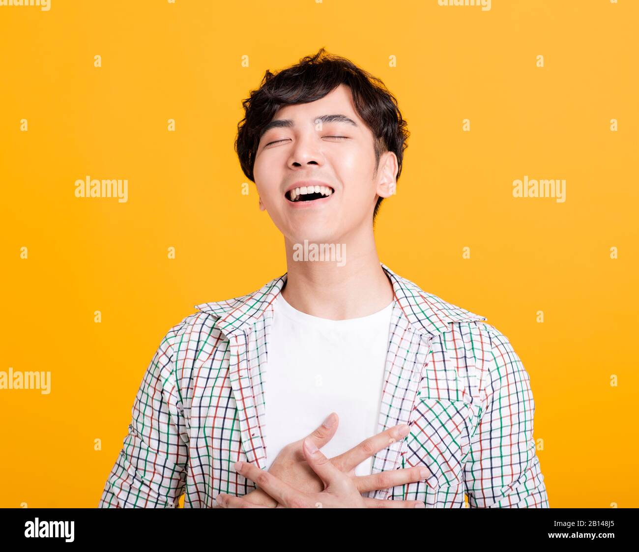 happy Asian young  man with laugh face Stock Photo
